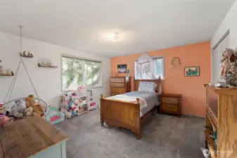 Second of three spacious guest bedrooms on upper level.