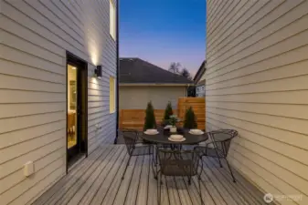 Just outside, a cozy patio. Perfect for enjoying the morning breeze with your coffee