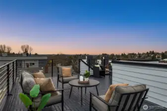 This large rooftop deck is perfect for hosting get togethers - large enough for tables chairs & even a couch!