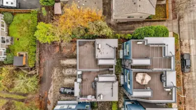 Far Left Corner (split that building into two units 9732-A is the full Southern half) deeded parking is in the middle, with EV.