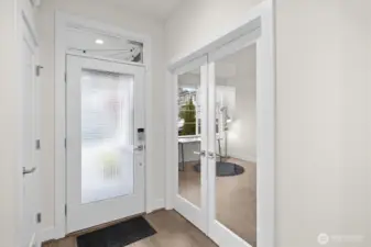 The entryway makes a welcoming first impression with clean lines and a sense of openness.