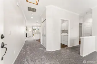 Enter into a spacious entry way