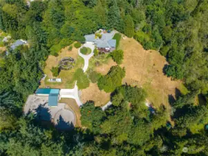 This equestrian estate is nestled on a picturesque 5-acre lot (plus a second 5-acre lot) among the trees and provides serine privacy.  It offers the perfect blend of luxury and functionality for you and your equine friends!