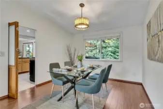 Dining room with kitchen to the left