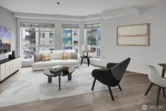 Inside, the open-concept layout offers modern finishes and efficient living, all just steps from vibrant local shops, dining, and the waterfront.