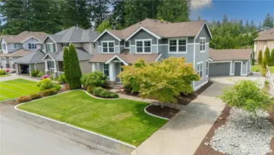 Plenty of parking and then some - this long, welcoming driveway leads to an oversized 2-car garage that’s ready for whatever you’ve got in mind. Hobbies? Workshop? Just need more storage? You’ve got the space to make it happen.