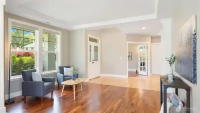 Just to the left of the front door (as you walk in), you’ll find a main floor office framed by classic French doors - an ideal space that adapts to your needs. Whether you're running the show from your home office, hosting overnight guests, or creating a cozy reading nook, this versatile room adds both function and charm right where you want it.
