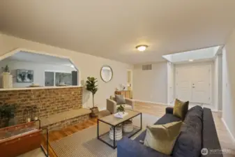 Living room with opening to kitchen