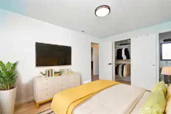 Large virtually staged primary bedroom