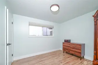 Bedroom 2 also with laminated flooring new paint and windows