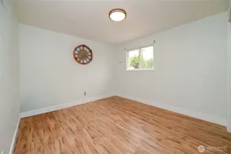 Large 2nd view of bedroom 4 at other end of home