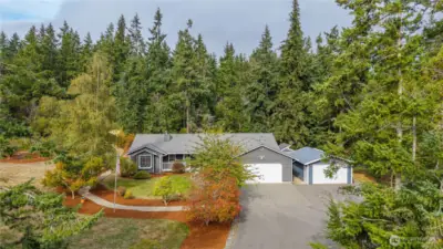 Beautiful spacious single level home, on 2.5 acres with meticulous landscaping and a lovely combination of both forest and cleared land. Plenty of room to expand!