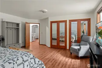 Gorgeous mirrored closet doors, with plenty of room for storage are a lovely feature.