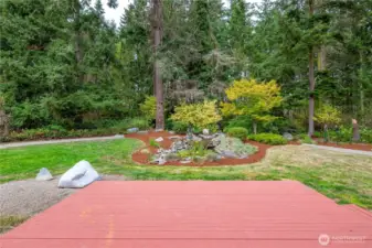 Enjoy the beautiful landscaping, including the custom water-fall feature!