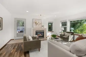 Cozy fireplace, access to back patio/outdoor oasis.