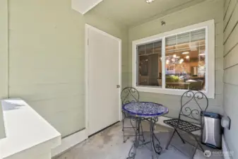 Front porch for that morning cup and a large storage unit for extra stuff.