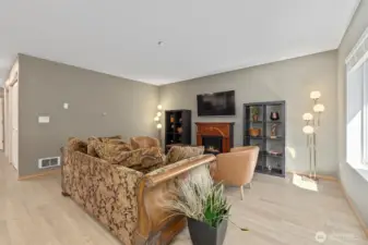 Front living room area, with brand new flooring, fresh interior paint, brand new window coverings throughout. making this a true turnkey unit.