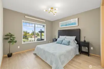 Primary bedroom, new paint, new floors.