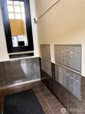 Secure mailboxes are found just inside of the secure entrance to the building.