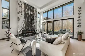 Standing in your living room, looking out to your patio. Greenbelt in the background.