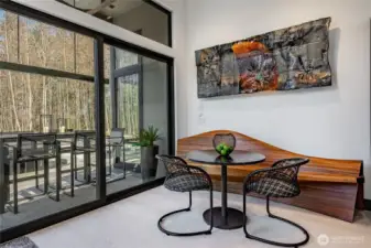Eating space off of your kitchen with sliding door going out to your outdoor eating area. Mahogany custom bench.