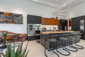 All appliances are Gaggenau. The island is Neolitch Pitt, with Pitt gas cooktop.