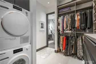 Walk-in closet includes washer/dryer.