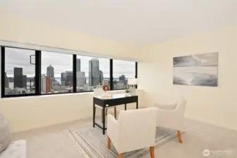 1 of 3 bedrooms with city views