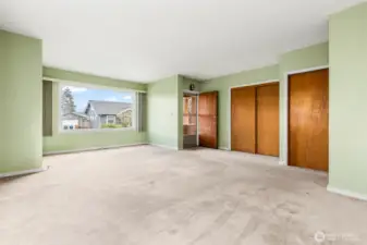 Double doors are a large closet, single door leads to the HUGE basement area that provides abundant storage space