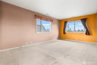 Upper level living / dining room has two large windows for wonderful natural light