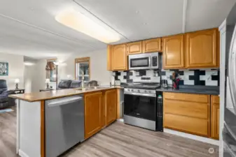 Lots of space in the kitchen to entertain and visit at the same time.