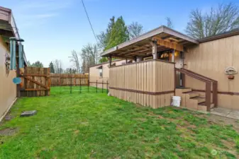 Large fenced backyard.