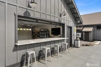 Garage "bar" with retractable door.