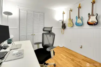 One of the four bedrooms is used as an office.