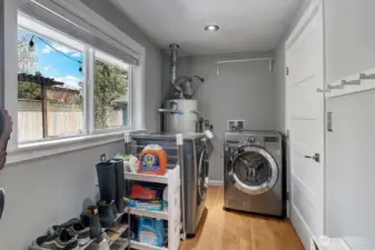 Mudroom/Utility room features ample storage.