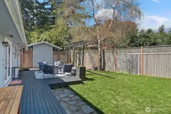The fully fenced level backyard for all your summer BBQ needs.