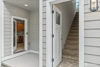 Separate entrance to upstairs apartment.