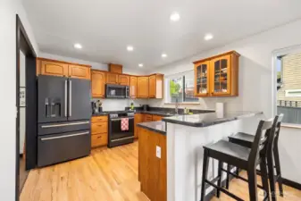 Looking across the kitchen with the raised eating bar.