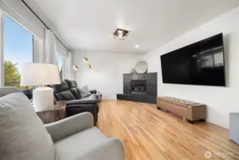 Looking toward the gas fireplace at the end of the large family room (the television is 90" to give you a perspective on size).