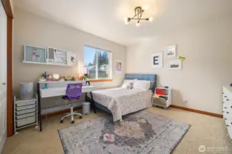 The 3rd bedroom also faces toward the front of the home and is generously sized.