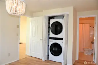 Private laundry in the bedroom.