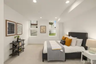 Lower level features a bedroom with an ensuite and closet. New carpet.