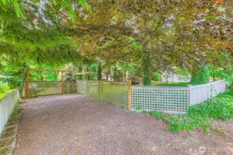The second driveway offers private parking for the lower level ADU or RV parking