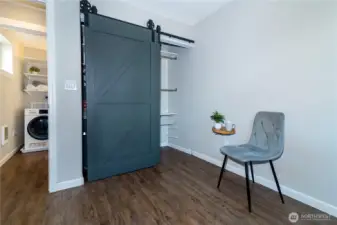 Primary Bedroom, built-in's in the closed as well as hot water heater in closet