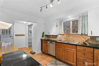 Laundry area to left of side entry before kitchen