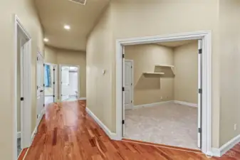 Wide hallways, wood floors throughout.