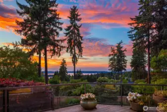 Experience breathtaking sunsets and sweeping west and north vistas from this stunning Clyde Hill luxury home.