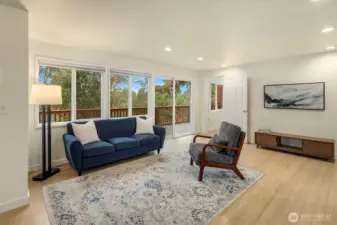 Main floor family room with a second access point to the expansive deck