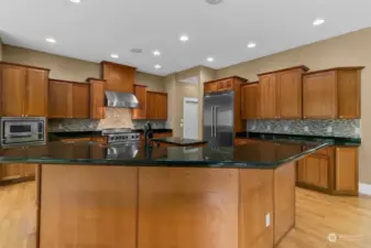 Gather with Guests around the Spacious Kitchen with extended Breakfast Bar