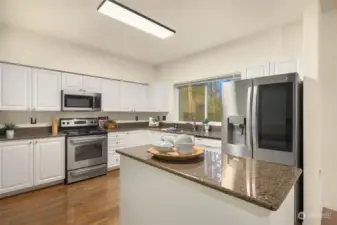 Gorgeous kitchen with granite counters and all new appliances